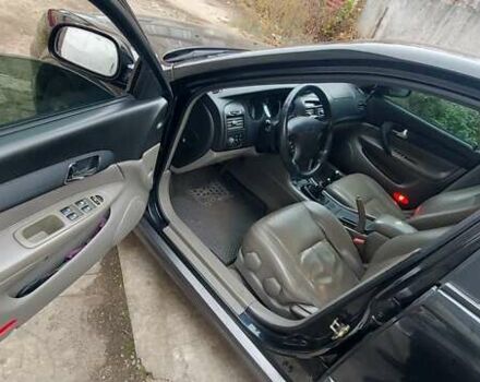 Черный Шевроле Эванда, объемом двигателя 2 л и пробегом 220 тыс. км за 4000 $, фото 8 на Automoto.ua