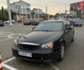 Черный Шевроле Эванда, объемом двигателя 2.5 л и пробегом 250 тыс. км за 3515 $, фото 1 на Automoto.ua