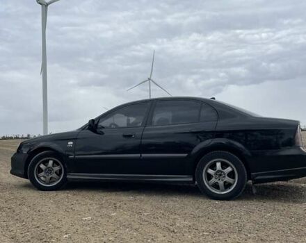 Черный Шевроле Эванда, объемом двигателя 2.5 л и пробегом 278 тыс. км за 2700 $, фото 4 на Automoto.ua