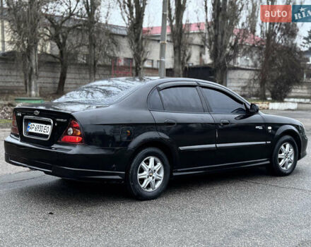 Чорний Шевроле Еванда, об'ємом двигуна 2 л та пробігом 303 тис. км за 2950 $, фото 3 на Automoto.ua
