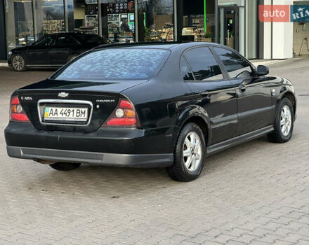 Черный Шевроле Эванда, объемом двигателя 2.5 л и пробегом 165 тыс. км за 3499 $, фото 4 на Automoto.ua