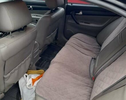 Черный Шевроле Эванда, объемом двигателя 2 л и пробегом 200 тыс. км за 3800 $, фото 4 на Automoto.ua