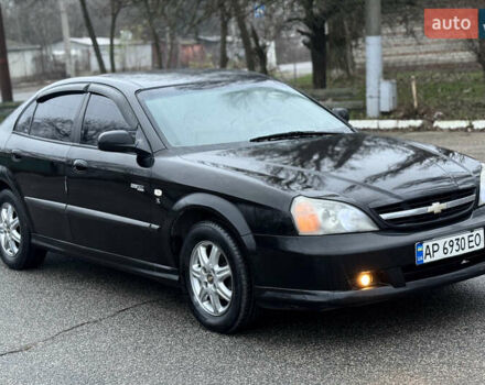 Чорний Шевроле Еванда, об'ємом двигуна 2 л та пробігом 303 тис. км за 2950 $, фото 2 на Automoto.ua