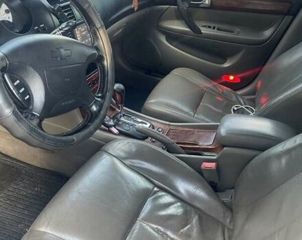 Черный Шевроле Эванда, объемом двигателя 2.5 л и пробегом 278 тыс. км за 2700 $, фото 15 на Automoto.ua