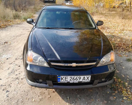 Черный Шевроле Эванда, объемом двигателя 2 л и пробегом 260 тыс. км за 4150 $, фото 14 на Automoto.ua