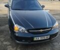 Чорний Шевроле Еванда, об'ємом двигуна 2 л та пробігом 81 тис. км за 5000 $, фото 1 на Automoto.ua