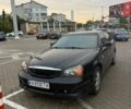 Чорний Шевроле Еванда, об'ємом двигуна 2.5 л та пробігом 256 тис. км за 3500 $, фото 1 на Automoto.ua