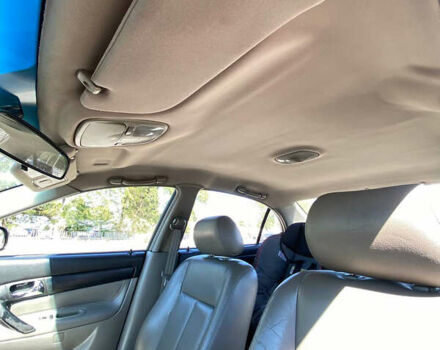 Черный Шевроле Эванда, объемом двигателя 2 л и пробегом 266 тыс. км за 3600 $, фото 5 на Automoto.ua