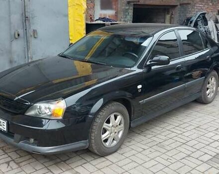 Черный Шевроле Эванда, объемом двигателя 2 л и пробегом 220 тыс. км за 4000 $, фото 1 на Automoto.ua