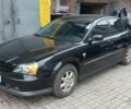 Черный Шевроле Эванда, объемом двигателя 2 л и пробегом 220 тыс. км за 4000 $, фото 1 на Automoto.ua