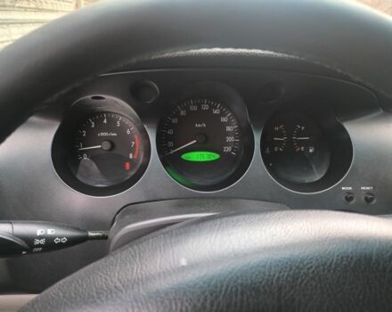 Черный Шевроле Эванда, объемом двигателя 2 л и пробегом 180 тыс. км за 3000 $, фото 1 на Automoto.ua