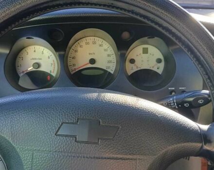 Черный Шевроле Эванда, объемом двигателя 2.5 л и пробегом 215 тыс. км за 3114 $, фото 9 на Automoto.ua