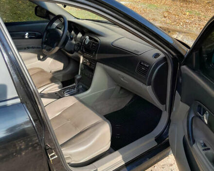 Черный Шевроле Эванда, объемом двигателя 2 л и пробегом 260 тыс. км за 4150 $, фото 4 на Automoto.ua