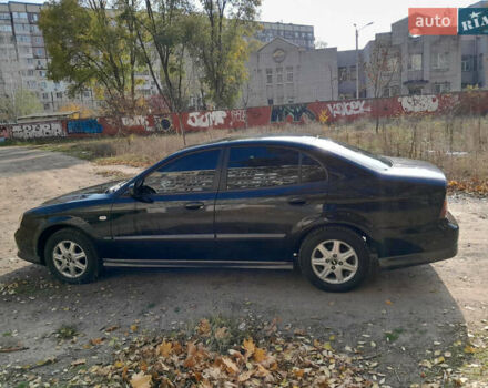 Черный Шевроле Эванда, объемом двигателя 2 л и пробегом 260 тыс. км за 4150 $, фото 9 на Automoto.ua