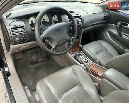 Черный Шевроле Эванда, объемом двигателя 2.5 л и пробегом 165 тыс. км за 3499 $, фото 9 на Automoto.ua