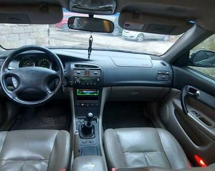 Черный Шевроле Эванда, объемом двигателя 2 л и пробегом 220 тыс. км за 4000 $, фото 10 на Automoto.ua