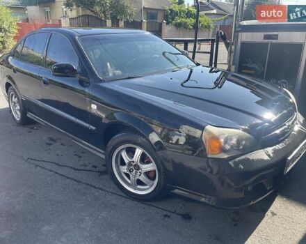 Черный Шевроле Эванда, объемом двигателя 2.5 л и пробегом 278 тыс. км за 2700 $, фото 11 на Automoto.ua