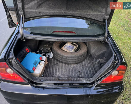 Черный Шевроле Эванда, объемом двигателя 2 л и пробегом 260 тыс. км за 4000 $, фото 6 на Automoto.ua