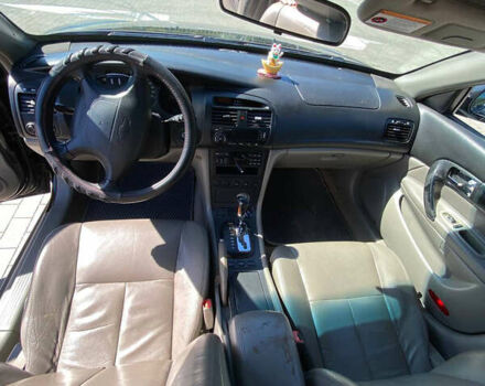 Черный Шевроле Эванда, объемом двигателя 2 л и пробегом 266 тыс. км за 3600 $, фото 3 на Automoto.ua