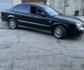 Чорний Шевроле Еванда, об'ємом двигуна 2 л та пробігом 140 тис. км за 1300 $, фото 1 на Automoto.ua