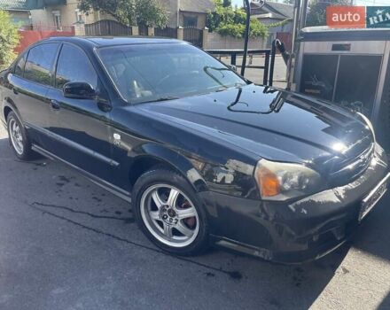 Черный Шевроле Эванда, объемом двигателя 2.5 л и пробегом 278 тыс. км за 2700 $, фото 12 на Automoto.ua