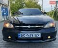 Чорний Шевроле Еванда, об'ємом двигуна 2.49 л та пробігом 248 тис. км за 2450 $, фото 1 на Automoto.ua