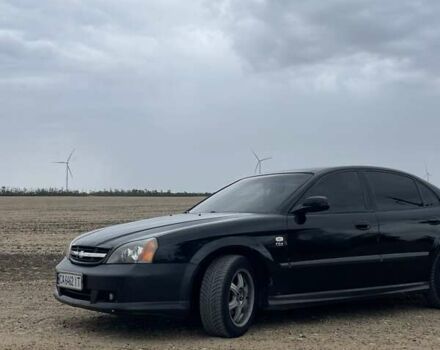 Черный Шевроле Эванда, объемом двигателя 2.5 л и пробегом 278 тыс. км за 2700 $, фото 1 на Automoto.ua