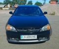 Чорний Шевроле Еванда, об'ємом двигуна 2 л та пробігом 188 тис. км за 5500 $, фото 1 на Automoto.ua