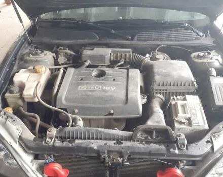 Черный Шевроле Эванда, объемом двигателя 2 л и пробегом 200 тыс. км за 3800 $, фото 2 на Automoto.ua