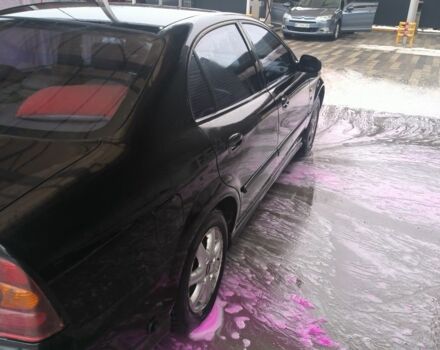 Черный Шевроле Эванда, объемом двигателя 2 л и пробегом 180 тыс. км за 3000 $, фото 8 на Automoto.ua