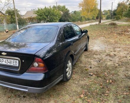 Шевроле Эванда 2006 в Вольнянске на Automoto.ua Черный Шевроле Эванда, объемом двигателя 2.5 л и пробегом 184 тыс. км за 4059 $, фото 3 на Automoto.ua