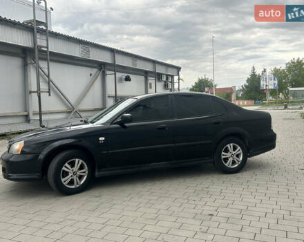 Чорний Шевроле Еванда, об'ємом двигуна 2 л та пробігом 472 тис. км за 2999 $, фото 5 на Automoto.ua