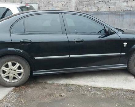 Черный Шевроле Эванда, объемом двигателя 2 л и пробегом 220 тыс. км за 4000 $, фото 4 на Automoto.ua