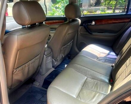 Черный Шевроле Эванда, объемом двигателя 2.5 л и пробегом 303 тыс. км за 3400 $, фото 5 на Automoto.ua