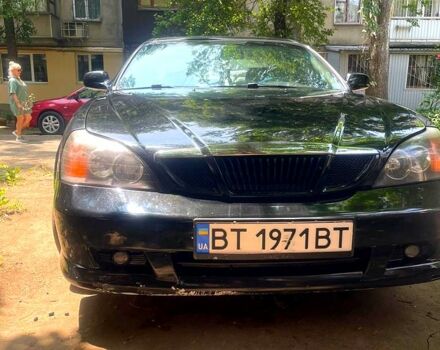 Черный Шевроле Эванда, объемом двигателя 2.5 л и пробегом 303 тыс. км за 3400 $, фото 4 на Automoto.ua