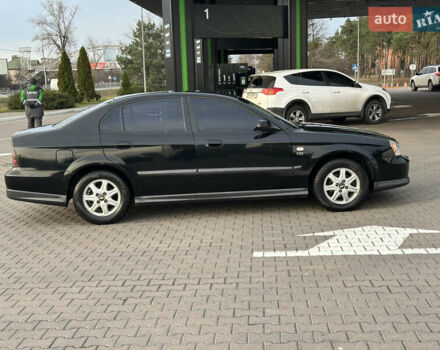 Черный Шевроле Эванда, объемом двигателя 2.5 л и пробегом 165 тыс. км за 3499 $, фото 3 на Automoto.ua