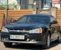 Чорний Шевроле Еванда, об'ємом двигуна 2 л та пробігом 289 тис. км за 3700 $, фото 1 на Automoto.ua