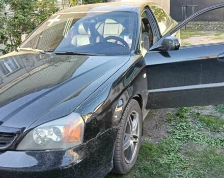 Черный Шевроле Эванда, объемом двигателя 2.5 л и пробегом 215 тыс. км за 3114 $, фото 11 на Automoto.ua