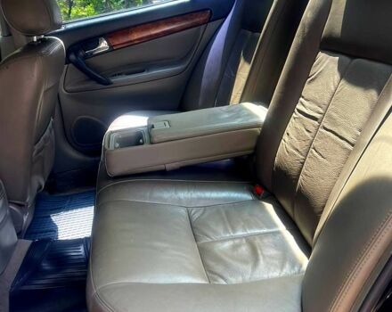 Черный Шевроле Эванда, объемом двигателя 2.5 л и пробегом 303 тыс. км за 3400 $, фото 2 на Automoto.ua