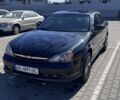 Черный Шевроле Эванда, объемом двигателя 2 л и пробегом 240 тыс. км за 3800 $, фото 1 на Automoto.ua