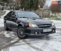 Чорний Шевроле Еванда, об'ємом двигуна 2 л та пробігом 250 тис. км за 3500 $, фото 1 на Automoto.ua
