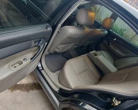 Черный Шевроле Эванда, объемом двигателя 2 л и пробегом 220 тыс. км за 4000 $, фото 13 на Automoto.ua