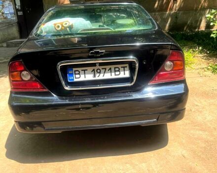 Черный Шевроле Эванда, объемом двигателя 2.5 л и пробегом 303 тыс. км за 3400 $, фото 3 на Automoto.ua