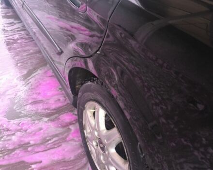 Черный Шевроле Эванда, объемом двигателя 2 л и пробегом 180 тыс. км за 3000 $, фото 5 на Automoto.ua