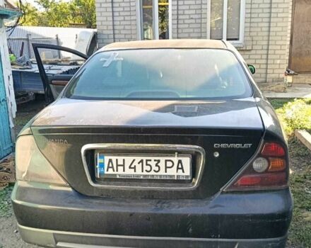 Черный Шевроле Эванда, объемом двигателя 2.5 л и пробегом 215 тыс. км за 3114 $, фото 1 на Automoto.ua