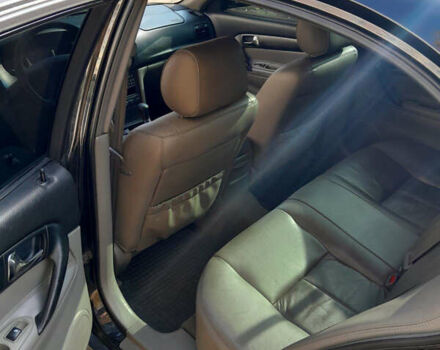 Черный Шевроле Эванда, объемом двигателя 2 л и пробегом 260 тыс. км за 4150 $, фото 6 на Automoto.ua