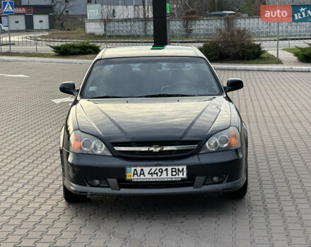 Черный Шевроле Эванда, объемом двигателя 2.5 л и пробегом 165 тыс. км за 3499 $, фото 1 на Automoto.ua