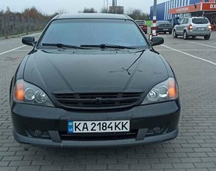 Черный Шевроле Эванда, объемом двигателя 2.49 л и пробегом 298 тыс. км за 3999 $, фото 2 на Automoto.ua