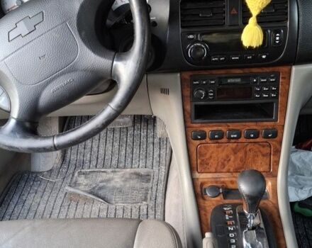 Черный Шевроле Эванда, объемом двигателя 2 л и пробегом 300 тыс. км за 850 $, фото 6 на Automoto.ua