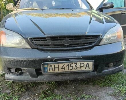 Черный Шевроле Эванда, объемом двигателя 2.5 л и пробегом 215 тыс. км за 3114 $, фото 12 на Automoto.ua